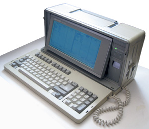 Переносной компьютер Sharp PC-7000 в рабочем состоянии с загруженным Norton Commander с дискеты