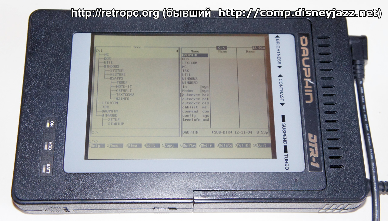 Планшетный ноутбук Dauphin DTR-1 с клавиатурой и блоком питания в рабочем состоянии (Нортон)