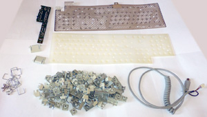 Части клавиатуры KB-5311 DIN AT - плата, подложка, клавиши, плёнка, шнур, ножки, элементы креплений